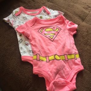 Two super hero onesies newborn